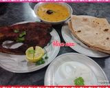 A picture of step 3 of Fry fish, Mung aur masoor ki daal aur Roti.