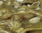 Foto del paso 6 de la receta Alcachofas con almejas en salsa verde