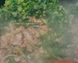 A picture of step 3 of Mustard leaves with sardines mix stir fry.