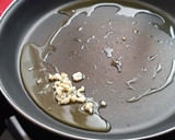 Foto del paso 4 de la receta: Arroz negro con mariscos