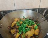 A picture of step 6 of Spiny gourd potato dry curry.