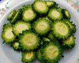 A picture of step 1 of Bitter Gourd Curry.