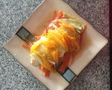 Foto del paso 3 de la receta: Pescado empapelado con topping de mango