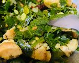A picture of step 4 of Drumstick leaves with sun dried lentil dumplings.