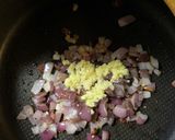 A picture of step 4 of Potato, cauliflower and pea curry - vegan.