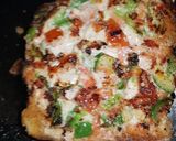 A picture of step 7 of Tawa bread pizza.