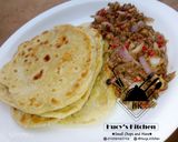 A picture of step 7 of Paratha with onion and fish sauce.