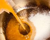 A picture of step 1 of Orange pudding with dash of tutti frutti.