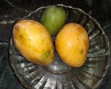 A picture of step 1 of Mango stuffing with mango panipuri shots.