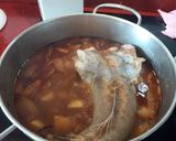 A picture of step 1 of Arroz a banda rossejat with Monkfish.