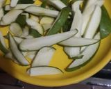 A picture of step 3 of Instant Kachi ambi pickle.