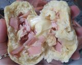 Foto del paso 7 de la receta: PANCITOS RELLENOS DE JAMÓN Y QUESO EN LA SARTÉN 🥖🧀🥓🍳