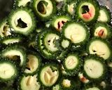 A picture of step 1 of Karela mirchi.