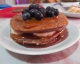 Foto del paso 3 de la receta: Pancakes de chocolate con dulce de leche, banana y arándanos