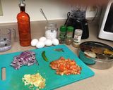 A picture of step 1 of Egg Drop/Poached Egg Curry.