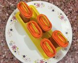A picture of step 9 of Mango Popsicles.