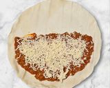 Foto del paso 7 de la receta: Empanada de hojaldre rellena de salsa boloñesa y queso 🧀