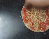 A picture of step 6 of Sandwich pizza from leftover Roti.