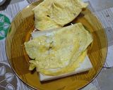 A picture of step 7 of Omelet Sandwich.
