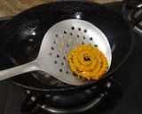 A picture of step 5 of Moong Dal Chakli.