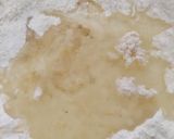 A picture of step 2 of Chicken Tikka pizza.