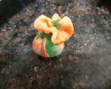 A picture of step 16 of Tricolor mawa potli.