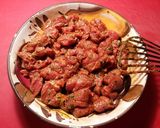 Foto del paso 13 de la receta Patatas orgánicas al horno con cebolla roja y pinchos morunos