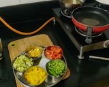 A picture of step 6 of Jain Pav bhaji sizzlar.