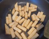 A picture of step 8 of Fried rice cake.