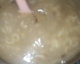 A picture of step 8 of Maggi soup with roasted nuts and chicken 😋😋😋😋.