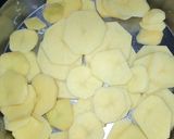 A picture of step 1 of Tomato Chilli Potato Fry.