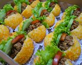 Foto langkah ke 6 dari resep Roti Goreng dengan Ayam Cincang dan Sayuran.