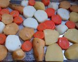 Foto del paso 7 de la receta: Merluza con papas, boniatos y zanahoria al horno