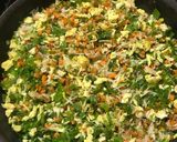 A picture of step 4 of Kung pao chicken with egg fried rice.
