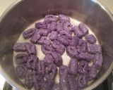 Foto del passaggio 6 della ricetta Gnocchi di patata viola con gorgonzola e nocciole