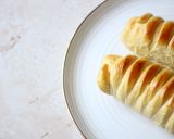 A picture of step 11 of Stuffed Sausage Bread Rolls.