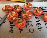 Une image de l'étape 5 de Tomates à l'ail mariné,romarin et épices.