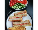 Sajttal és kolbásszal töltött bundáskenyér recept fázis 2 fotója