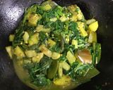 A picture of step 3 of Spinach sabji or palong shaker ghonto.