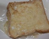 A picture of step 2 of French Toast with banana n Strawberry 😋.