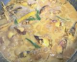 Gambar langkah 8 resipi Sotong Sumbat Masak Lemak Kuning.