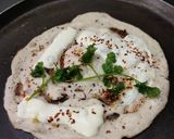 A picture of step 2 of Owar cheese pizza dosa with tomato onion chutney gravy.