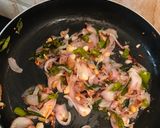 A picture of step 4 of Meen Pollichathu- Kerala style fried fish steamed in banana leaf.