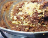 A picture of step 4 of Peanuts and dates sweet.