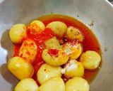 A picture of step 2 of Gralic potatoes with fryms. (lasaniya aloo & fryums).