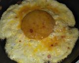 A picture of step 2 of Cheesy Egg Burger.