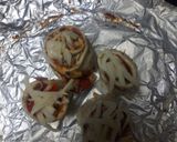 A picture of step 4 of Herbed pizza roll ups.