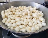 A picture of step 1 of Makhana Raita In Cucumber Boat - Vrat Raita.