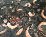 Foto del paso 2 de la receta: Arroz negro de calamares y langostinos