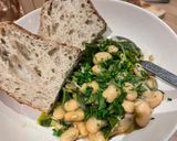 A picture of step 7 of Miso Butter Beans with leeks and spring greens (GF, VG).